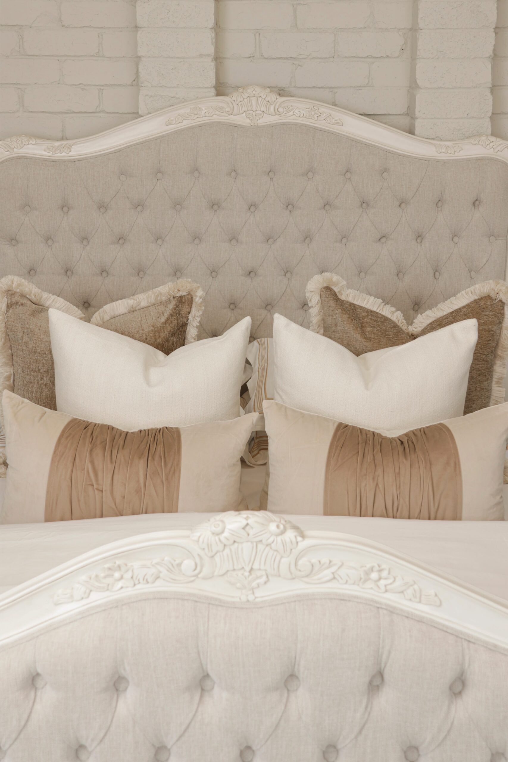 Alice French Provincial Bed in antique white with carved timber detailing and a button-tufted headboard and footboard