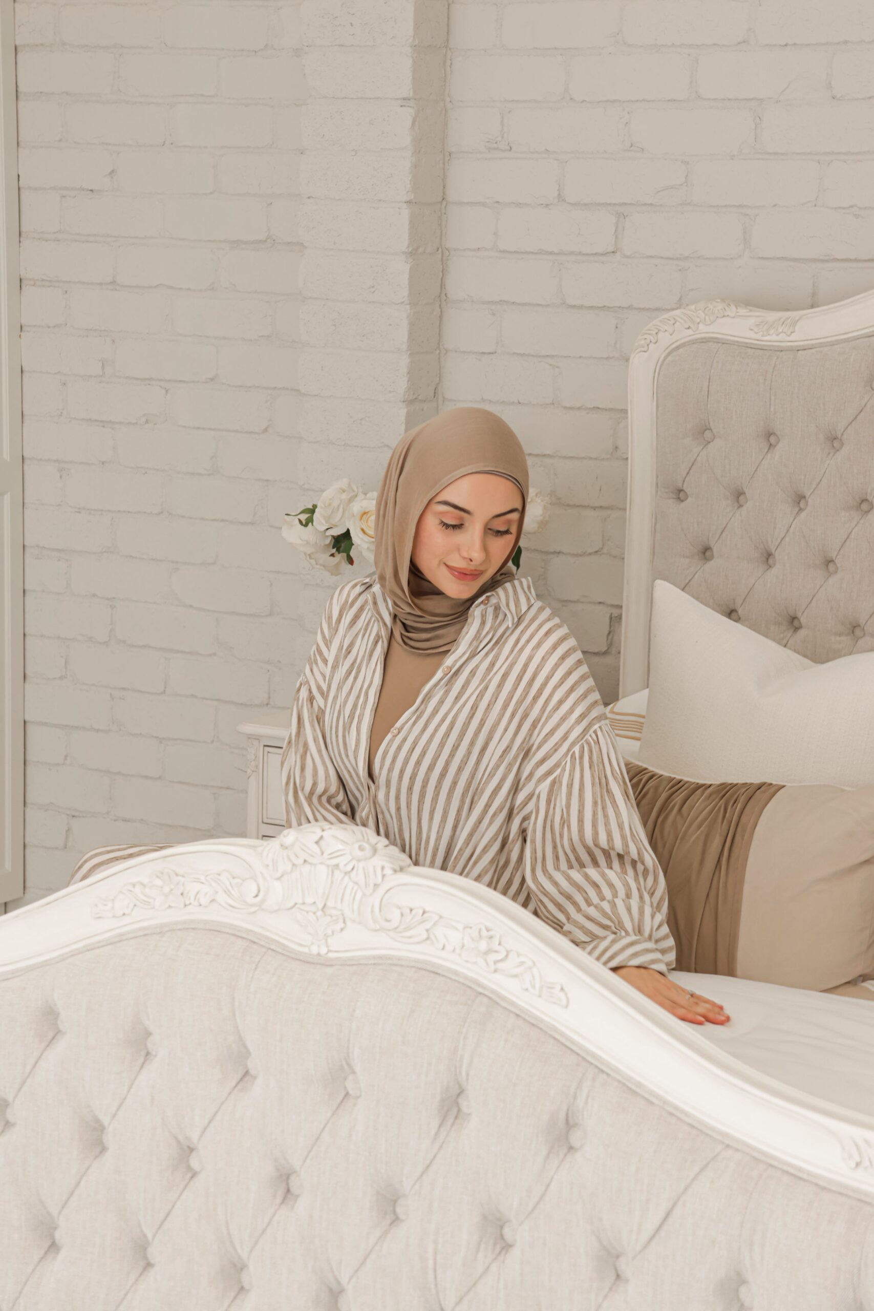 Alice French Provincial Bed in antique white with carved timber detailing and a button-tufted headboard and footboard