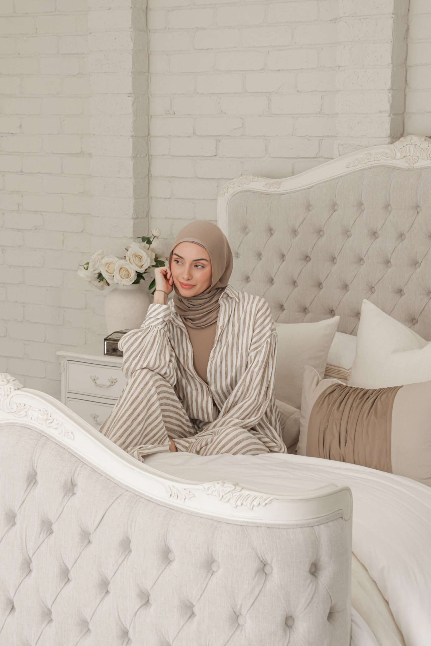 Alice French Provincial Bed in antique white with carved timber detailing and a button-tufted headboard and footboard