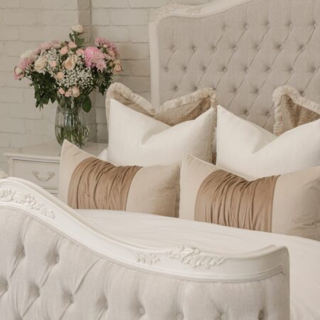 Alice French Provincial Bed in antique white with carved timber detailing and a button-tufted headboard and footboard