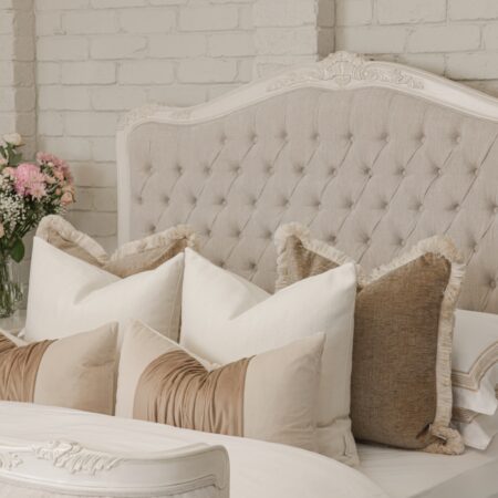 Alice French Provincial Bed in antique white with carved timber detailing and a button-tufted headboard and footboard