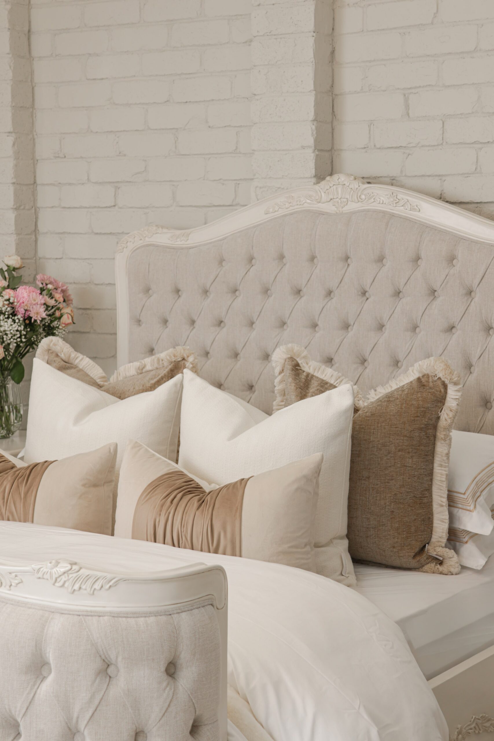 Alice French Provincial Bed in antique white with carved timber detailing and a button-tufted headboard and footboard