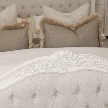 Alice French Provincial Bed in antique white with carved timber detailing and a button-tufted headboard and footboard
