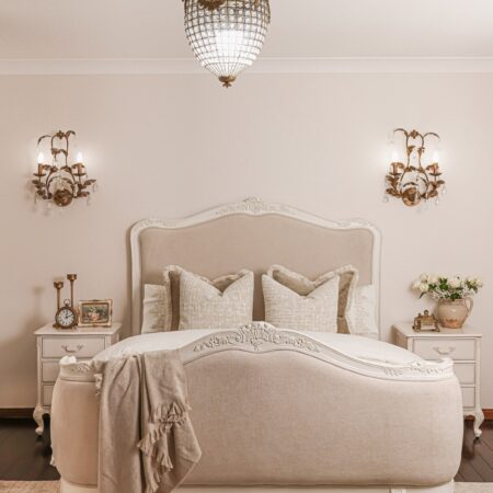 Alice Classic French Bed with an antique white carved frame and smooth upholstered headboard and footboard