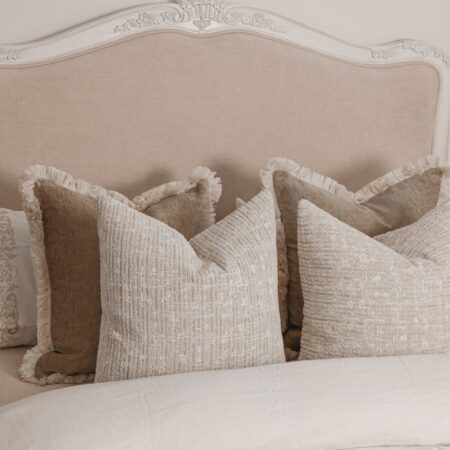 Alice Classic French Bed with an antique white carved frame and smooth upholstered headboard and footboard