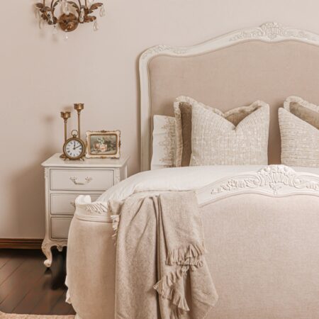 Alice Classic French Bed with an antique white carved frame and smooth upholstered headboard and footboard