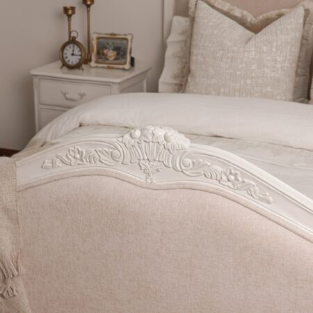 Alice Classic French Bed with an antique white carved frame and smooth upholstered headboard and footboard