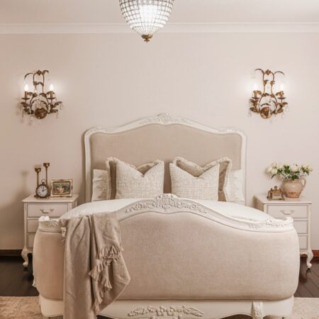 Alice Classic French Bed with an antique white carved frame and smooth upholstered headboard and footboard